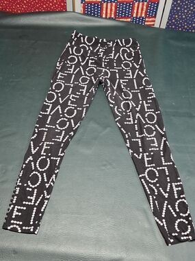 **No Boundaries Black Leggings with White "LOVE" Dot Print**